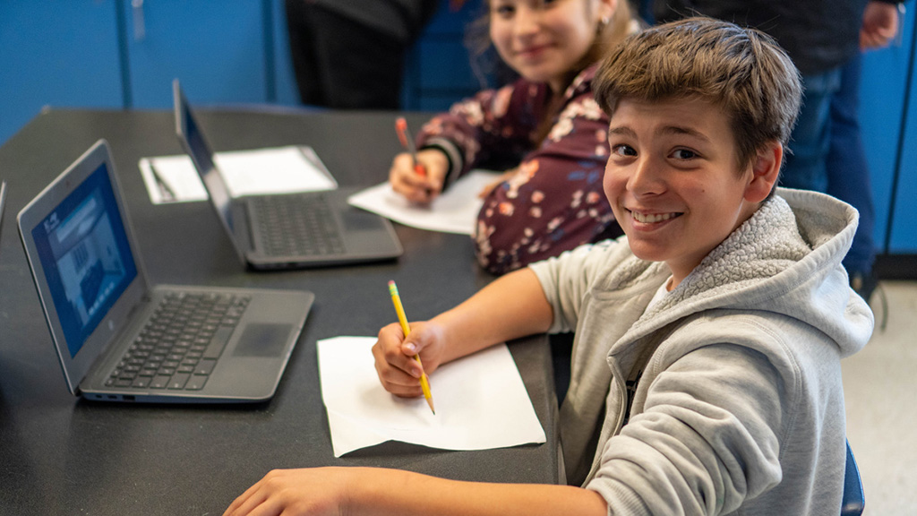 Students working on schoolwork in class